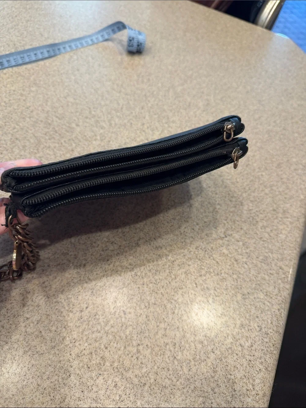 Guess Black Embossed Signature Wristlet with Chain and Heart Charm